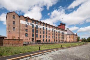 Image of the restored Shrewsbury Flaxmill Maltings building on a sunny day.